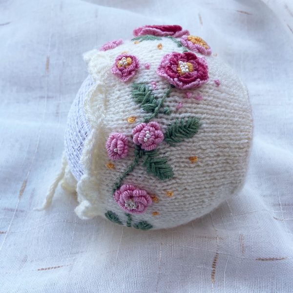 nurture pink bonnet side